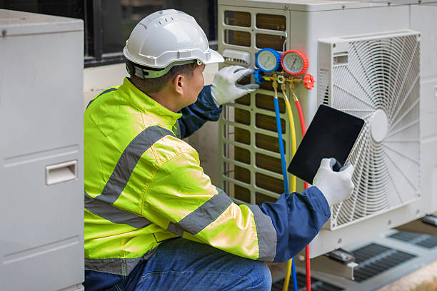 Professional Heat Pump Repair technician working in Northbridge, MA